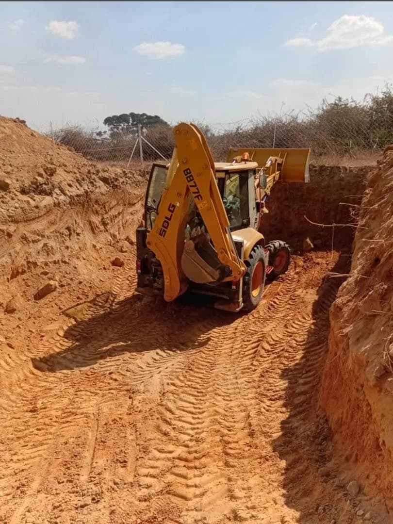 Mandre backhoe loader working on site in Zimbabwe